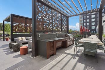 Outdoor grill with intimate seating area